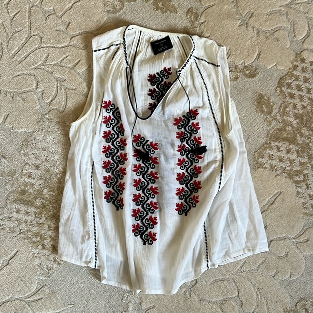 Peasant style sleeveless top with tassels, from Barney’s